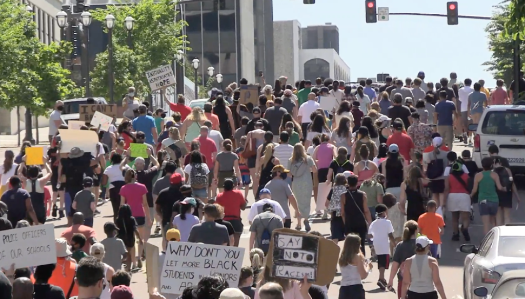 Clayton-anti-racism-rally-on-June-13-showing-placards-critical-of-school-district