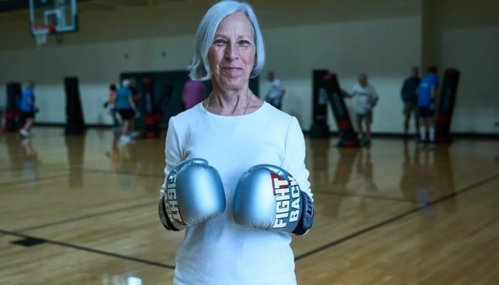 Mary Eagan with boxing gloves